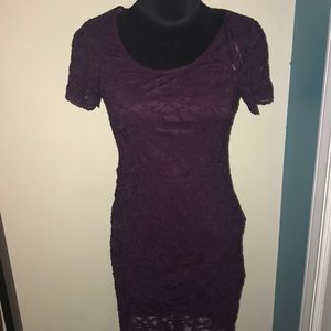 A beautiful nice fitting maroon purple dress